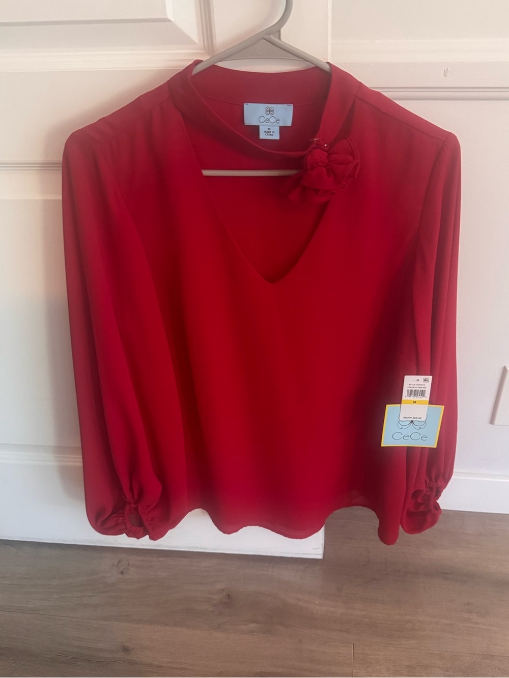CeCe Red V-Neck Blouse with Floral Neck Detail